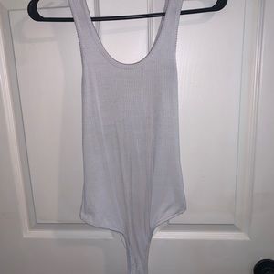Women’s white body suit